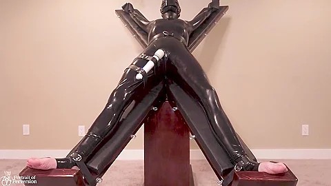 Latex Servitude Floozy Is Made To Have Multiple Orgasms On A Cross