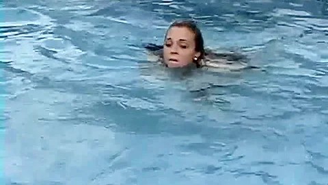 Meche Miley straitjacketed in pool